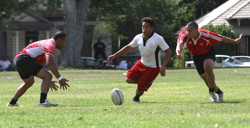 Rick Egan  | The Salt Lake Tribune 

The Lions (white) play the Spartans (red) in the rugby tournament, at the National Tongan American Society's 16th Annual "Friendly Island Festival" at Fairmont Park in Sugar House, Saturday, August 10, 2013.
