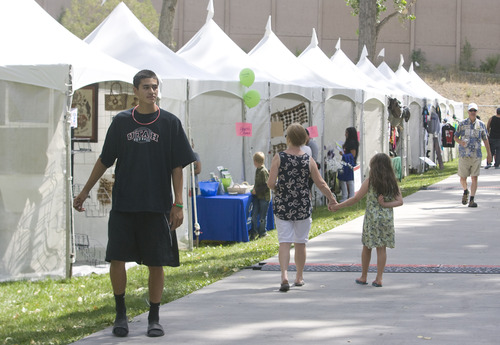 Rick Egan  | The Salt Lake Tribune 

Booths with Tongan art, Jewelry, and food, at the National Tongan American Society's 16th Annual "Friendly Island Festival" at Fairmont Park in Sugar House, Saturday, August 10, 2013.