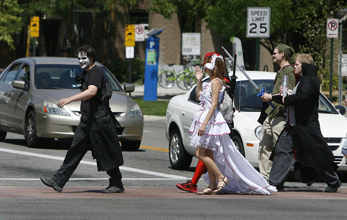 Scott Sommerdorf  |  The Salt Lake Tribune
Comic Con cosplayers, involved in a scavenger hunt all over downtown Salt Lake City, cross 200 East near the library on Saturday.
