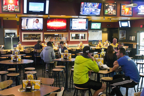Chris Detrick  |  The Salt Lake Tribune
Buffalo Wild Wings' Lehi restaurant. Last year liquor licenses were in such short supply that Buffalo Wild Wings stopped construction on its Layton location until the chain could get a liquor permit. Since then, lawmakers have protected restaurant chains against license shortages by creating master liquor permits, which became available in May.