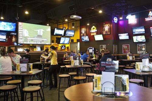 Chris Detrick  |  The Salt Lake Tribune
Last year liquor licenses were in such short supply that Buffalo Wild Wings stopped construction on its Layton location until the chain could get a liquor permit. Since then, lawmakers have protected restaurant chains against license shortages by creating master liquor permits, which became available in May. Pictured,  Buffalo Wild Wing' Lehi restaurant.
