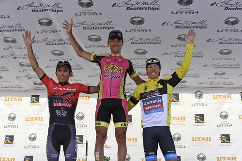 Stage 6 winner Francisco Mancebo Perez, center, of Spain, with the 5-hour Energy pb Kenda Racing team, waves from the podium with Janier Acevedo, left, of Columbia, with the Jamis - Hagens Berman team and Thomas Danielson, of team Garmin-Sharp, following the Tour of Utah cycling race, Sunday, Aug. 11, 2013, in Park City, Utah. Acevedo came in second place while Danielson came in third place during the stage. (AP Photo/Rick Bowmer)