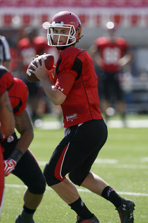 Francisco Kjolseth  |  The Salt Lake Tribune
Conner Manning looks for an open man as the University of Utah's football team holds their first preseason scrimmage at the stadium on Tuesday, August 13, 2013.