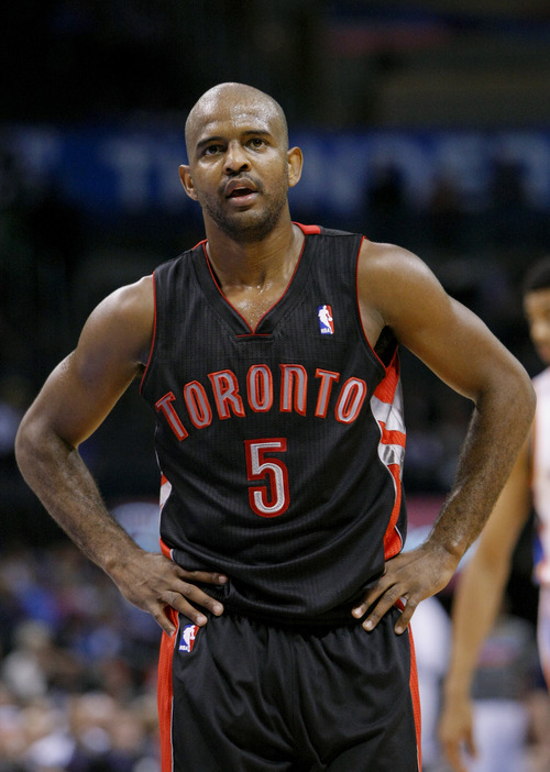Toronto Raptors point guard John Lucas (5) during a timeout against the Oklahoma City Thunder in the second half of an NBA basketball game in Oklahoma City, Tuesday, Nov. 6, 2012.  Oklahoma City won 108-88.  (AP Photo/Alonzo Adams)