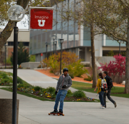 Trent Nelson  |  The Salt Lake Tribune
A skateboarder rides through the University of Utah campus in Salt Lake City, Tuesday May 7, 2013. The university is considering a ban on skateboarding.