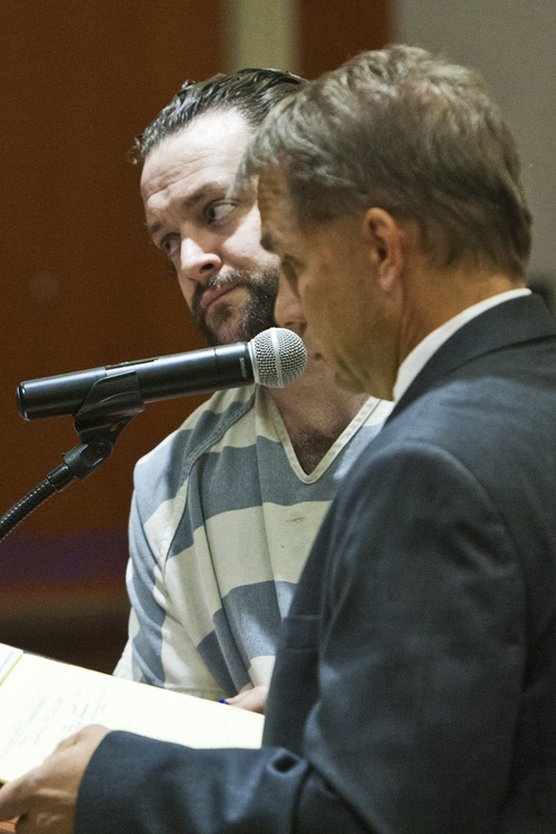 Chris Detrick  |  The Salt Lake Tribune
Nathan Sloop talks to defense lawyer Richard Mauro during his arraignment at Davis County Justice Court Tuesday August 13, 2013. Sloop, 34, pleaded not guilty on Tuesday to felony counts of aggravated murder, intentionally inflicting serious injury on a child, obstructing justice and abuse or desecration of a human body. Sloop will be tried in the 2010 death of his 4-year-old stepson Ethan Stacy on March 17 of next year.