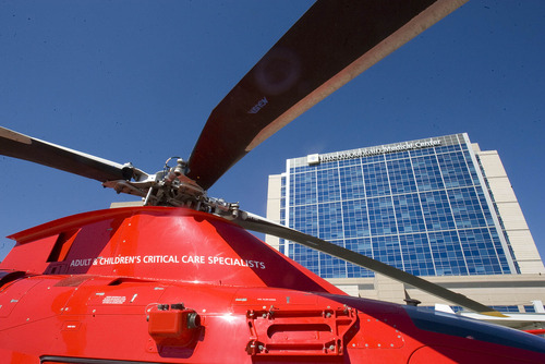 Paul Fraughton  |   The Salt Lake Tribune
A Life Flight helicopter sits on the helipad in front of the Intermountain Medical Center in Murray. Originally based at Salt Lake City's LDS Hospital, the emergency helicopter service, started in 1978, has transported nearly 63,00 patients in its 35 years. The service has expanded to serve the entire Intermountain West with seven helicopters, three airplanes and 248 employees.                          
 Wednesday, August 14, 2013