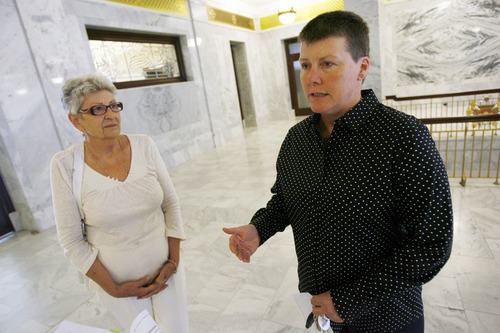 Francisco Kjolseth  |  The Salt Lake Tribune
Valerie Larabee, right, and Nikki Boyer from Utah Pride speak with the media after delivering a copy of the federal consitution and the Amicus brief to the Governors office at the Utah State Capitol on Tuesday, August 13, 2013. The attorney general and governor have responded to the federal court case protesting Utah Amendment 3, which says marriage is between man and a woman.