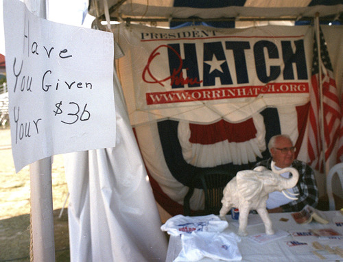 Leah Hogsten  |  Tribune file photo
"Have you given your $36?" says the sign at the booth of presidential candidate Sen. Orrin Hatch, R-Utah.
