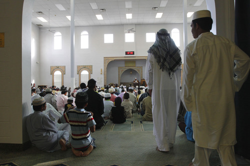 Al Hartmann  |  The Salt Lake Tribune
Utah Muslims gather at the Khadeeja Islamic Center in West Valley City on Thursday, Aug. 8, to celebrate the end of their monthlong fast for Ramadan.