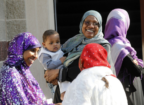 Al Hartmann  |  The Salt Lake Tribune
Utah Muslims greet friends and family members after prayers outside the Khadeeja Islamic Center in West Valley City on Thursday, Aug. 8, to celebrate the end of their monthlong fast for Ramadan.