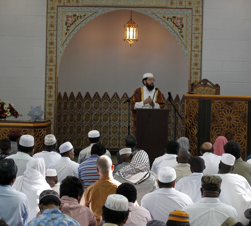 Al Hartmann  |  The Salt Lake Tribune
Imam Mohamed Shoayb Mehter leads Utah Muslims in prayers at the Khadeeja Islamic Center in West Valley City on Thursday, Aug. 8, to celebrate the end of their monthlong fast for Ramadan.
