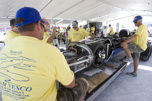 Paul Fraughton  |   Salt Lake Tribune
  Team Vesco works on The Turbinator prior to its run on the flats.                          
 Tuesday, August 13, 2013