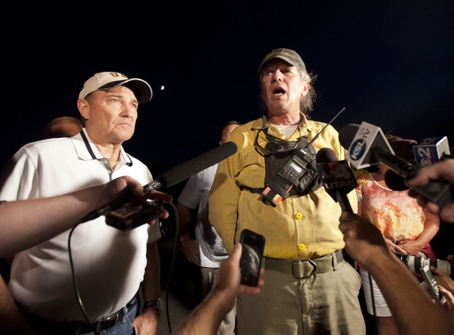 Lennie Mahler  |  The Salt Lake Tribune
Gov. Gary Herbert and Steve Rutter, Northeastern Area Fire Management Officer, speaks to the media as crews battle a blaze near Rockport State Park, Tuesday, Aug. 13, 2013. Rutter said the fire was difficult to contain because it spread at up to 50-80 feet per minute earlier in the day.