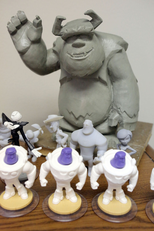 Francisco Kjolseth  |  The Salt Lake Tribune
The design process can be seen with this early sculpture of Sully from "Monsters Univesity" at Avalanche Software. The Salt Lake City video game development house gets ready to unveil their big video game called "Infinity," a mash up of games incorporating many of the toys from movies that people will recognize. The figurines which could prove popular with collectors, become active when placed on a base launching that character into a gaming platform.