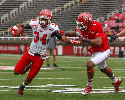 Trent Nelson  |  The Salt Lake Tribune
James Poole (34) runs for the end zone during the University of Utah's Red-White Spring football game, Saturday April 20, 2013 in Salt Lake City. At right is Keith McGill