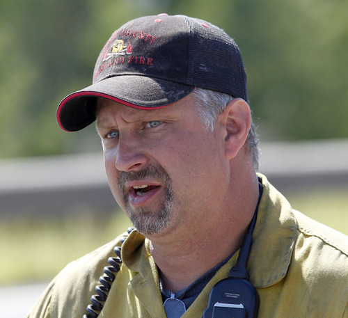 Al Hartmann  |  The Salt Lake Tribune
Rockport fire incident commader Bryce Boyer with the Utah Division of State Lands holds press conference outside the fire perimeter Thursday August 15 to give an update of the fire.