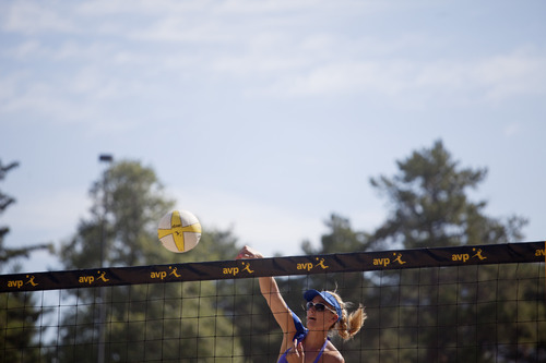 Jim McAuley | The Salt Lake Tribune

Kerri Walsh Jennings warms up her spike before a match against Emily Day and Brooke Niles at the AVP Salt Lake City Open beach volleyball tournament at Liberty Park on Saturday, August 17, 2013.