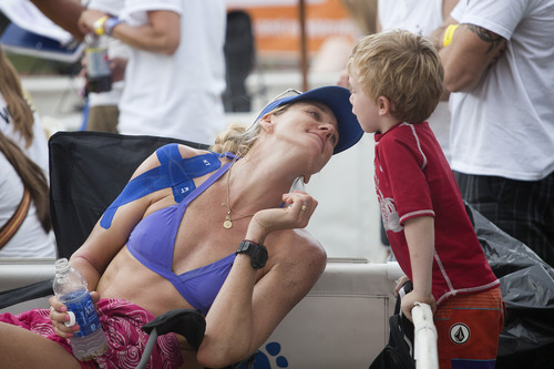 Jim McAuley | The Salt Lake Tribune

Kerri Walsh Jennings greets her four-year-old son Joseph Michael Jennings after losing in the AVP Salt Lake City Open beach volleyball tournament at Liberty Park on Saturday, August 17, 2013.