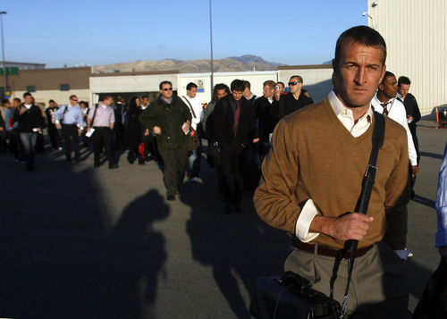 Rick Egan   |  The Salt Lake Tribune

Real head coach Jason Kreis, leads the team onto the plane, as the  team leaves the Salt Lake airport for Seattle where they will play for the MSL championship on Sunday. 

Thursday, November 19, 2009