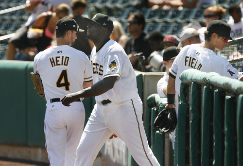 Scott Sommerdorf   |  The Salt Lake Tribune
Ex-MLB all-star pitcher Dontrelle Willis strides from the dugout to the mound as he makes his Bees debut at Spring Mobile Ballpark, Sunday, August 18, 2013.