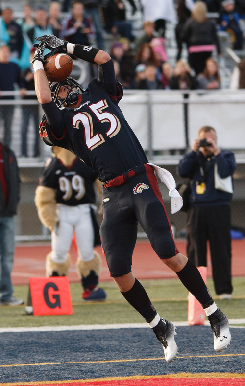 Trent Nelson  |  The Salt Lake Tribune
Herriman's Connor Johnson pulls in a touchdown pass. Herriman vs. East high school football, Saturday October 27, 2012 in Herriman, Utah.