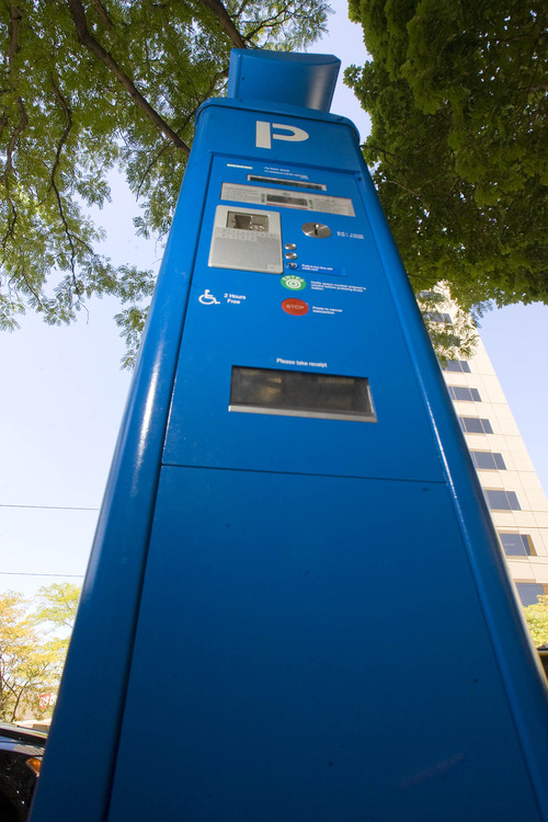 Paul Fraughton  |   The Salt Lake Tribune
A parking kiosk on Salt Lake City's Main Street. A new opinion poll says a majority of those surveyed like the kiosks and find them easy to use.  Wednesday, August 21, 2013
