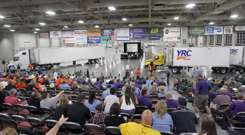 Al Hartmann  |  The Salt Lake Tribune
The audience watches as drivers compete in a driving course inside the Salt Palace Convention Center for the American Trucking Association National Truck Driving Championships in which 424 of the best professional truck drivers from around the country competed in nine different truck classes.