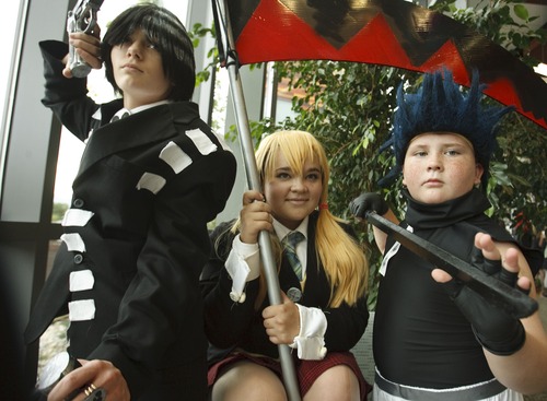 Leah Hogsten | The Salt Lake Tribune
l-r Souleater characters Blackstar, Makaelborn and Death the Kid. Teens dressed as their favorite animation character filled the ToshoCON event, the first ever teen anime convention at the Viridan Event Center, Saturday, August 17, 2013.