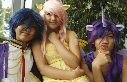 Leah Hogsten  |  The Salt Lake Tribune
Moonthara Lertsongkham, left, Natalie Welch and Tanner Lertsongkham are dressed as characters from No Sama and My Little Pony. Teens dressed on Saturday as their favorite animation character filled the ToshoCON event, the first ever teen anime convention at the Viridan Event Center.