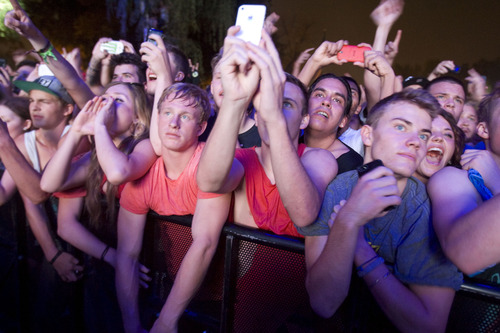Keith Johnson | The Salt Lake Tribune

Fans watch Kid Cudi perform at the Twilight Concert Series in Salt Lake City, August 22, 2013.