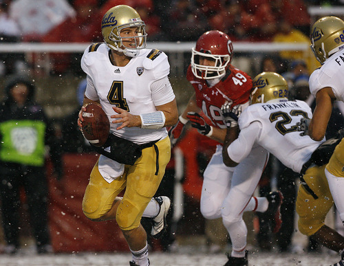Scott Sommerdorf  |  The Salt Lake Tribune             
UCLA Bruins quarterback Kevin Prince #4 is chased out of the pocket by Utah Utes linebacker Trevor Reilly #49 during first half play. Utah beat UCLA 31-6 at Rice-Eccles Stadium in Salt Lake City, Saturday, November 12, 2011.