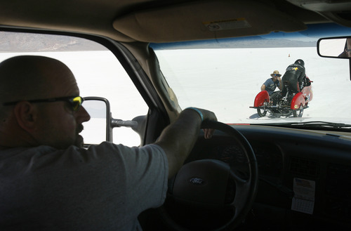 Scott Sommerdorf  |  The Salt Lake Tribune
Ronnie Wilson sits in the driver's seat of the chase vehicle as Dan Parker, a race car driver who lost his sight last year in an accident, is about to go on a practice run on the Bonneville Salt Flats, Sunday, August 25, 2013.