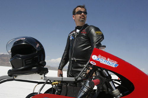 Scott Sommerdorf  |  The Salt Lake Tribune
Dan Parker, a race car driver who lost his sight last year in an accident, is about to get on his motorcycle for practice runs on the Bonneville Salt Flats, Sunday, August 25, 2013.