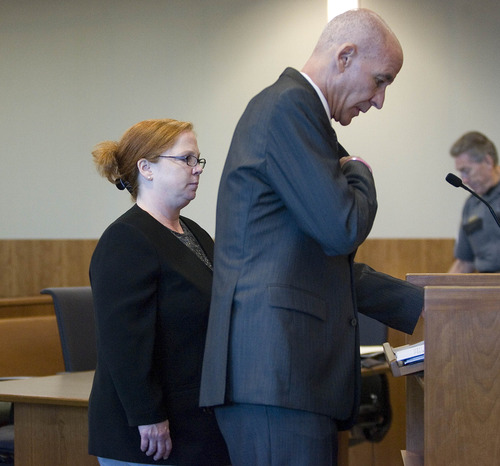 Paul Fraughton  |   The Salt Lake Tribune
Former justice court Judge Virginia Ward, standing next to her attorney Earl Xaiz, changes her plea to guilty in the Tooele County courtroom of Judge Robert Adkins.  Tuesday, August 27, 2013