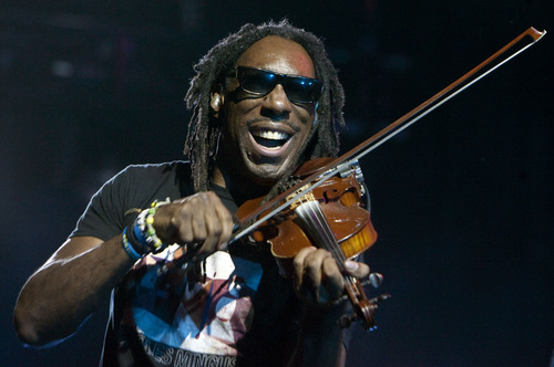 Steve Griffin | The Salt Lake Tribune

Dave Matthews Band violinist, Boyd Tinsley, smiles as he plays at the Usana Amphitheater in West Valley City, Utah, home Tuesday Aug. 27, 2013.