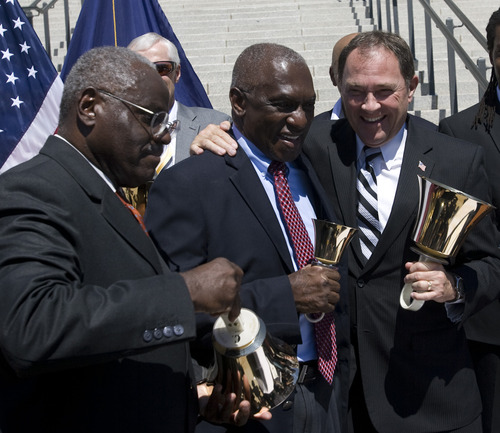 Rick Egan  | The Salt Lake Tribune 

Dr. Forrest Crawford (left), Rev. France Davis of Calvary Baptist Church (center) and Gov. Gary Herbert (right) at the "Let Freedom Ring" celebration on the 50th anniversary of Dr. Martin Luther King Jr.'s "I Have a Dream" speech, at the Utah State Capitol, Wednesday, August 28, 2013.