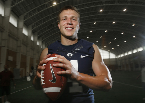 Scott Sommerdorf   |  The Salt Lake Tribune
BYU QB Taysom Hill at media day at their indoor facility in Provo, Thursday, August 8, 2013.