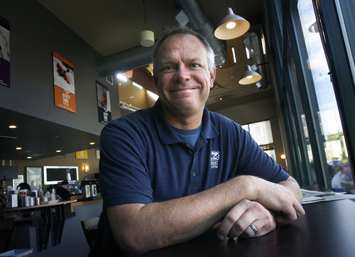 Scott Sommerdorf   |  The Salt Lake Tribune
Matt Happe, owner of the Silver Bean Coffee Company, has seen his business license fee of $200  increase to $700. Holladay city is cash-strapped but Happe believes this is bad for small businesses, Wednesday, Aug. 28, 2013.