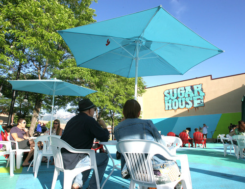 Rick Egan  | Tribune file photo 

The temporary Sugarmont Plaza in Sugar House had its opening party in June, shown here. The plaza is part of Salt Lake City's push for "lighter, quicker, cheaper" ways to enliven public spaces.