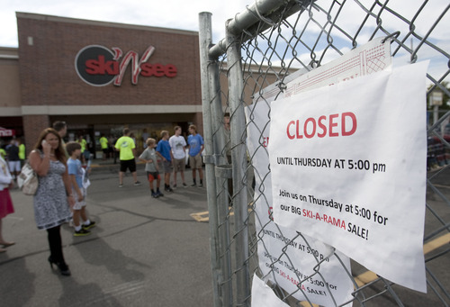 Steve Griffin | The Salt Lake Tribune

Shoppers line up outside the Ski N See store in Sandy on Thursday Aug. 22, 2013. The  fall ski blowout sale started at 5 p.m. in the parking lot outside the store.