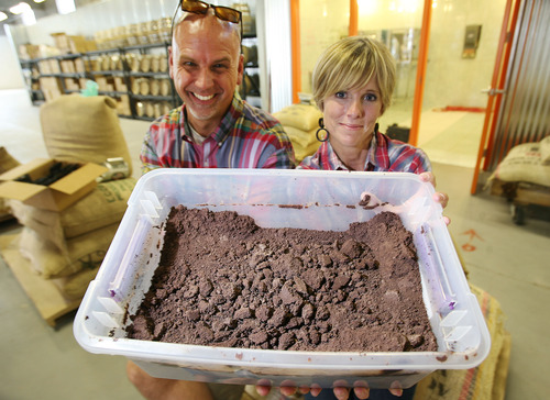 Steve Griffin | The Salt Lake Tribune
Topher and Shannon Webb with crumbled chocolate used to make their Mezzo drinking chocolate in the Mezzo offices in Salt Lake City Friday August 9, 2013.