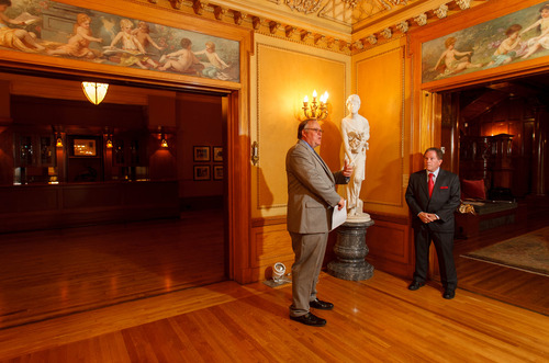 Trent Nelson  |  The Salt Lake Tribune
Mark Magleby, director of the Museum of Art at Brigham Young University, and Phil McCarthey speak at the McCune Mansion Tuesday, August 27, 2013 in front of the Blind Girl, sculpted by Giacomo Ginotti (1845-1897). The piece, in addition to another titled Cleopatra, has returned to the McCune Mansion after spending many years at the BYU Museum of Art.