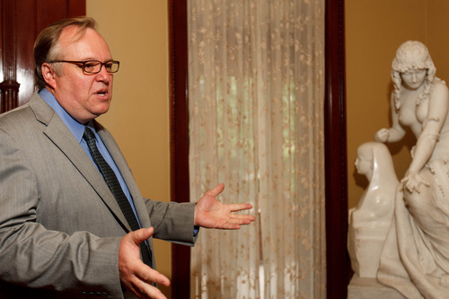 Trent Nelson  |  The Salt Lake Tribune
Mark Magleby, director of the Museum of Art at Brigham Young University, speaks at the McCune Mansion Tuesday, August 27, 2013 in front of Cleopatra, sculpted by Oscar Spalmach (1864–1917). The piece, in addition to another titled Blind Girl, has returned to the McCune Mansion after spending many years at the BYU Museum of Art.