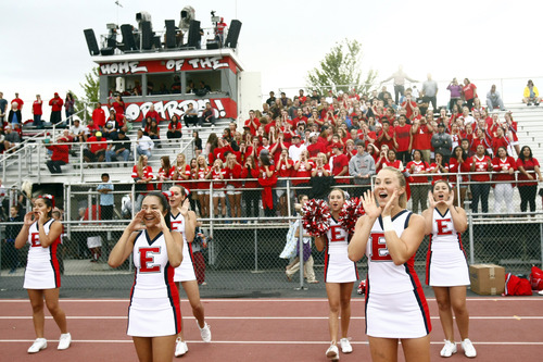 Chris Detrick  |  The Salt Lake Tribune
East High cheerleaders during the game at East High School Friday August 23, 2013. East is winning the game 21-10 at halftime.