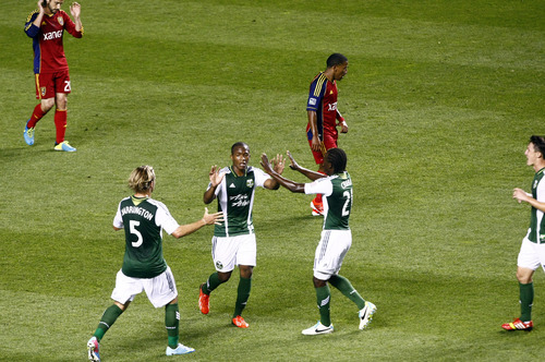 Chris Detrick  |  The Salt Lake Tribune
Portland Timbers forward/midfielder Darlington Nagbe (6) celebrates with Portland Timbers defender/midfielder Michael Harrington (5) and Portland Timbers midfielder Diego Chara (21) after scoring a goal during the first half of the game at Rio Tinto Stadium Friday August 30, 2013.
