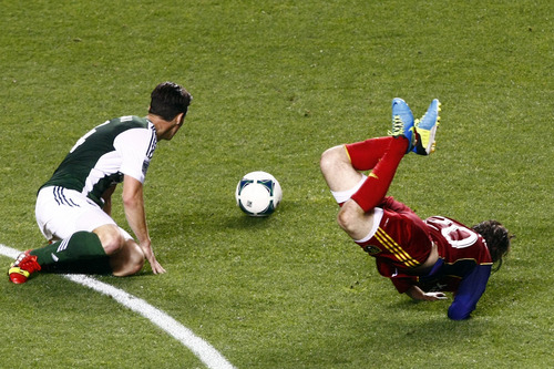 Chris Detrick  |  The Salt Lake Tribune
Portland Timbers midfielder Ben Zemanski (14) trips Real Salt Lake midfielder Ned Grabavoy (20) during the first half of the game at Rio Tinto Stadium Friday August 30, 2013. Zemanski was given a red card.