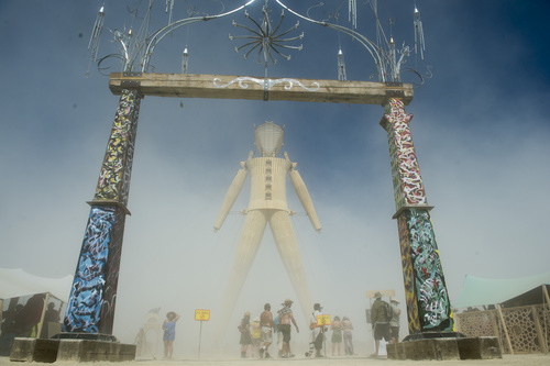 Rick Egan  |  The Salt Lake Tribune
The Burning Man stands a midst the blowing dust at the Burning Man Festival in the Black Rock Desert, 100 miles north of Reno, Nev., Thursday, August 28, 2014.