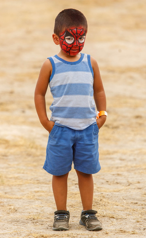 Trent Nelson  |  The Salt Lake Tribune
Emiliano Arana shows off his Spiderman makeup for a photo during the Antelope Island Stampede, Saturday, August 31, 2013 at Antelope Island's White Rock Bay.