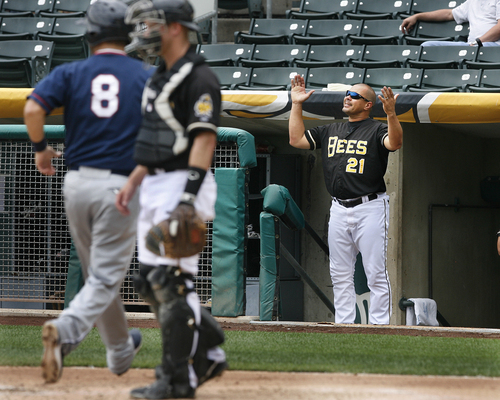 Scott Sommerdorf   |  The Salt Lake Tribune
As another Reno runner scores, Bees manager Keith Johnson reacts to a fielding error during a disastrous six-run second inning where Reno took a commanding 6-1 lead. The Salt Lake Bees lost 10-7 to the Reno Aces, Sunday, September 1, 2013.